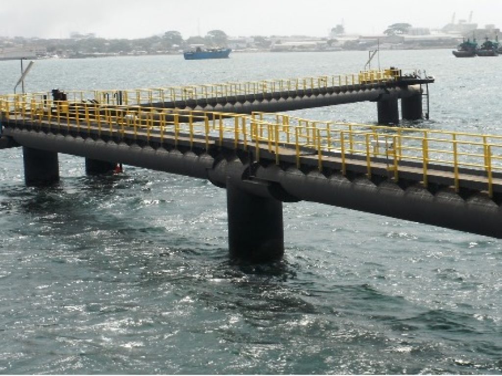 LEFT SIDE CATWALK ACCESS TO CAPSTANS WITH MOORING DOLPHINS